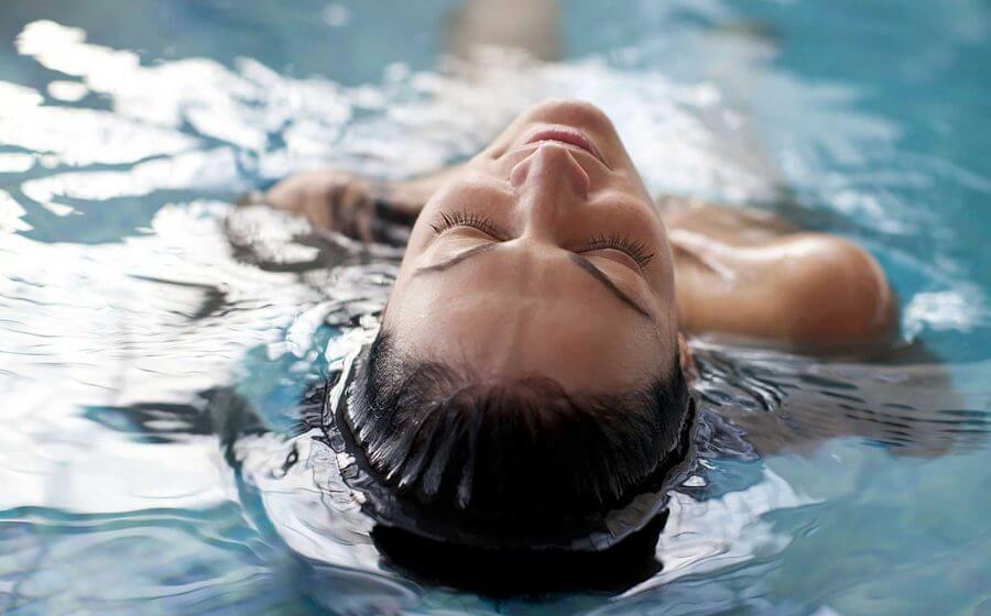 Woman swimming in pool