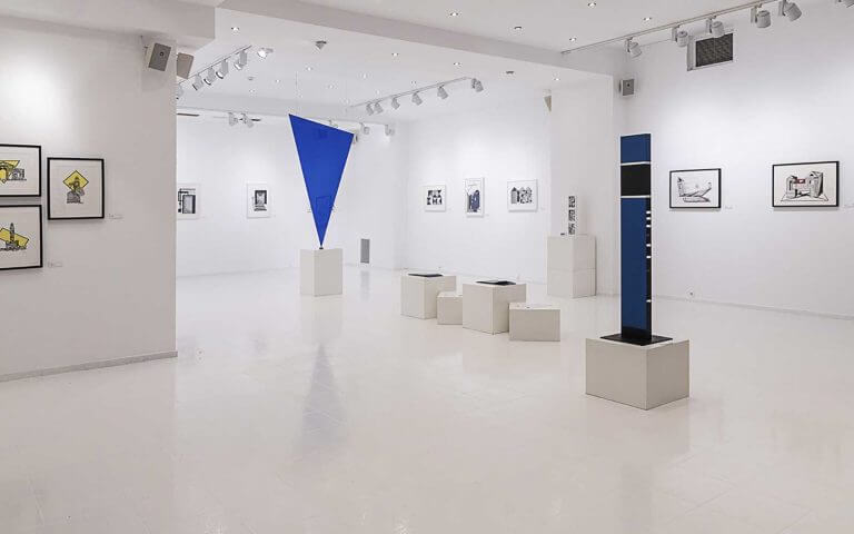 The gallery walls full of modern art pieces