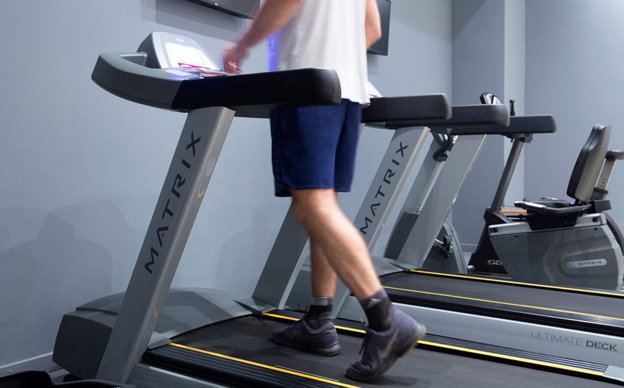 man using treadmill